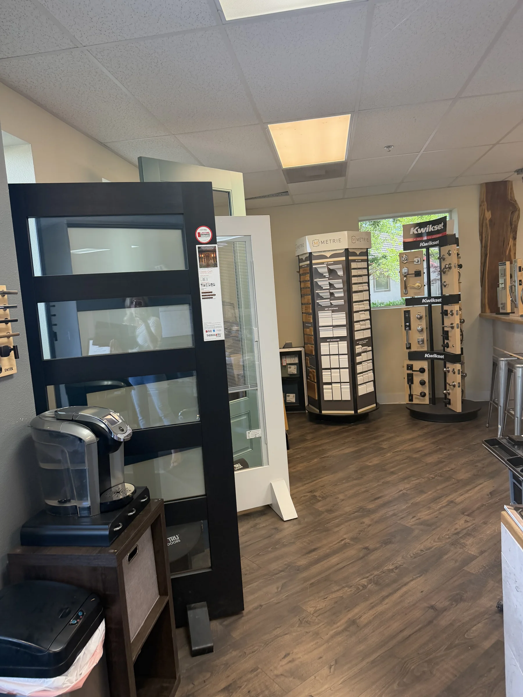 Interior of the Moore's Doors showroom with door, hardware, and product displays